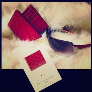 Prada shades and a Gucci wallet